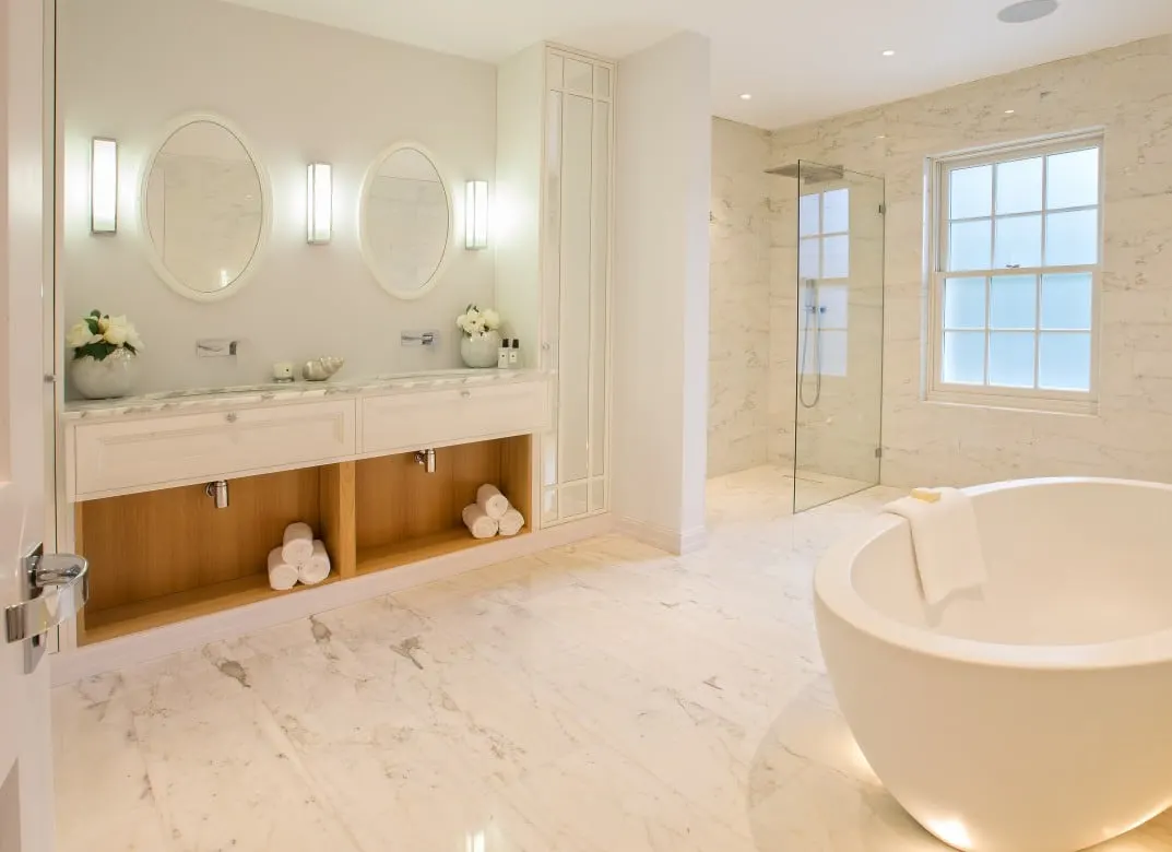 Master bathroom with a round freestanding bath and a double vanity, Kingston