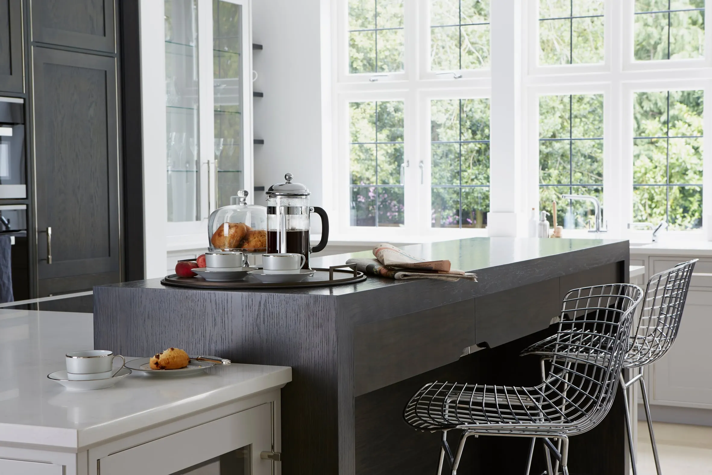 Breakfast bar in dark oak with a white stone top, Kingston